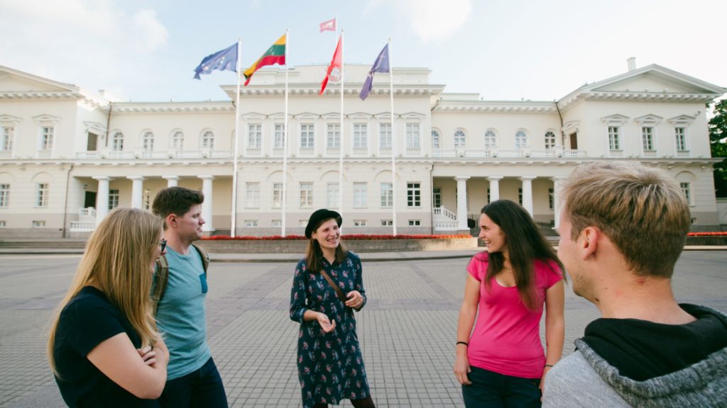 A group of tourists in front of Presidential Palace in Vilnius