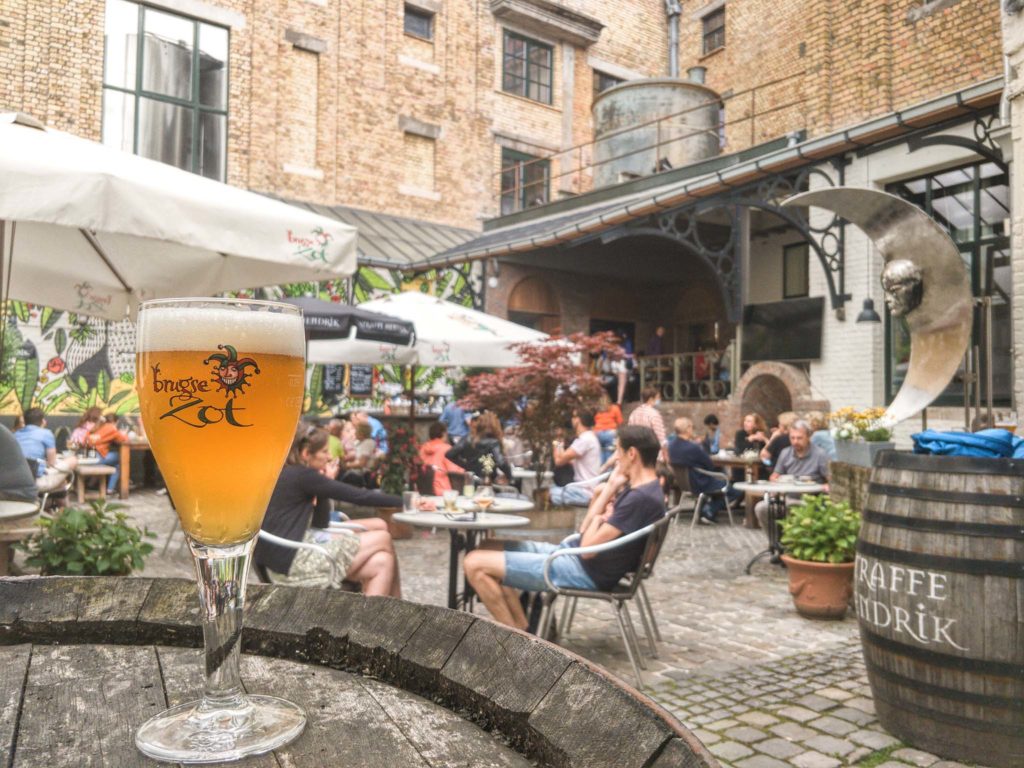 A Brugse Zot Blond beer from tap at the terrace of the brewery in Bruges
